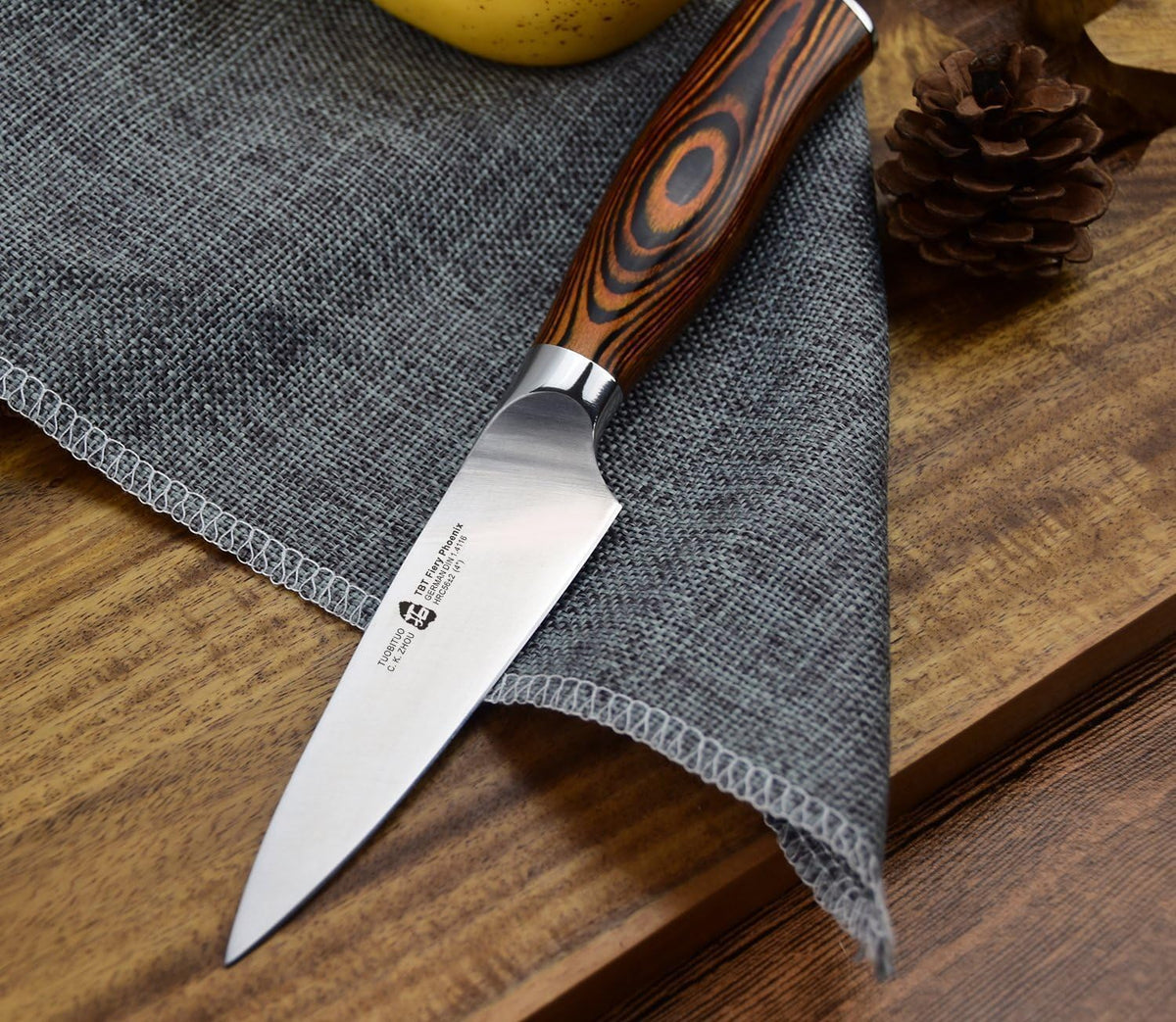 TUO Boning Knife - Razor Sharp Fillet Knife - High Carbon German Stainless Steel Kitchen Cutlery - Pakkawood Handle - Luxurious Gift Box Included - 7 inch - Fiery Phoenix Series - PuriLite